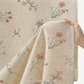 XOGUIBO linen-blend shower curtain provides light filtering and privacy