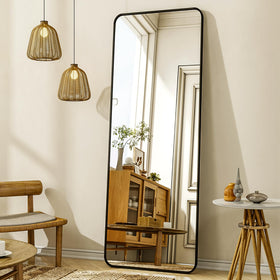 XRAMFY full-length mirror with stand offers full-body viewing in a living space