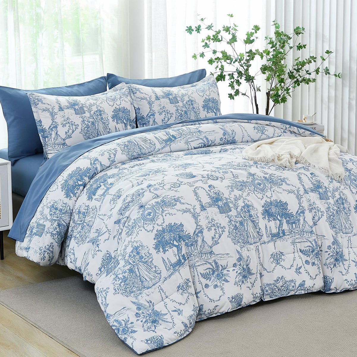 Xruibed blue comforter set king 7-piece displayed on bed for luxurious cozy styling.