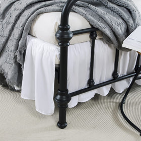 Xuan Dian bed skirt sits between mattress and box spring for neat drape.