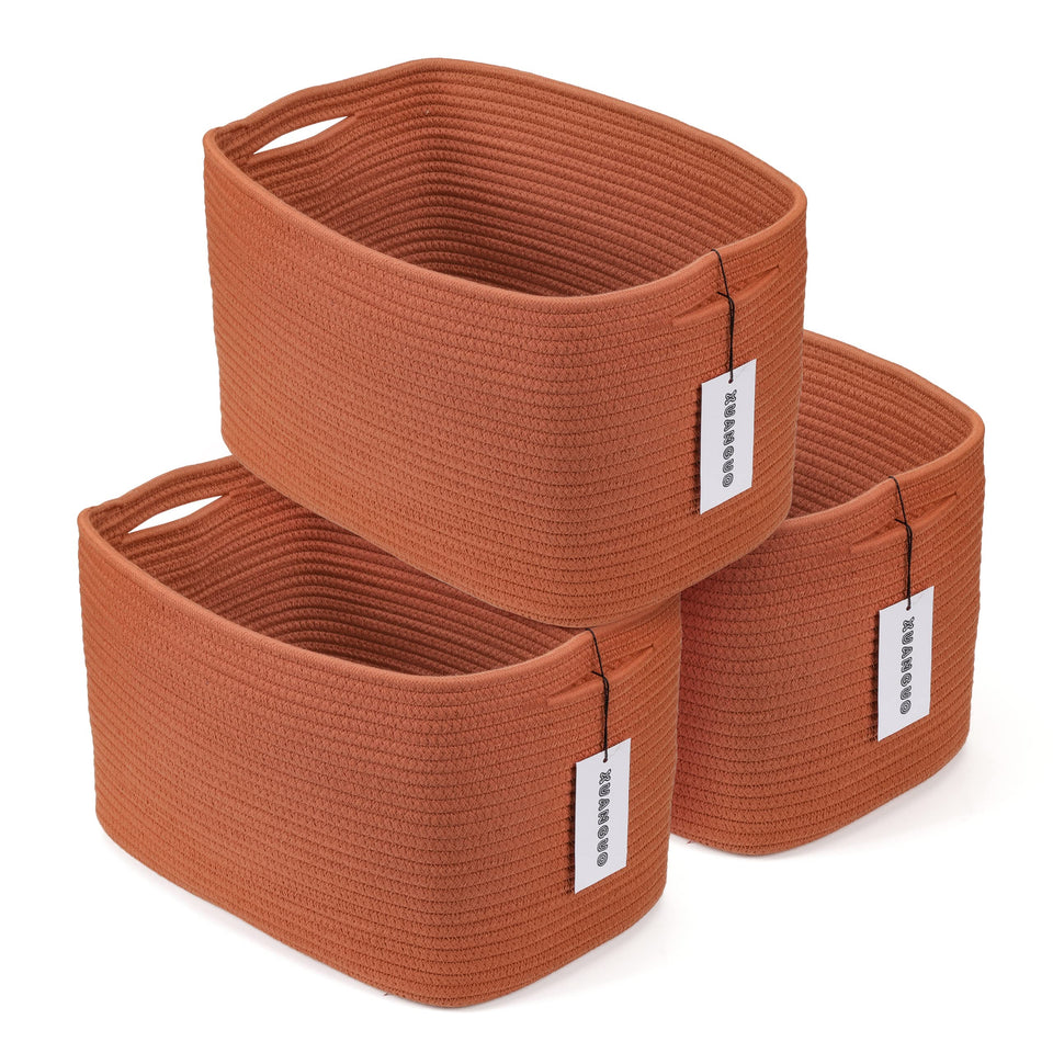 Xuanguo cotton rope storage basket with handles, ideal for on-shelf organization.