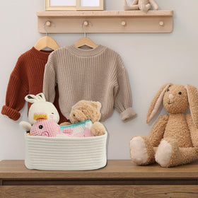 XUANGUO minimalist white basket adds chic decor while concealing clutter.