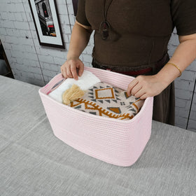 XUANGUO woven basket for nursery offers soft, safe storage.