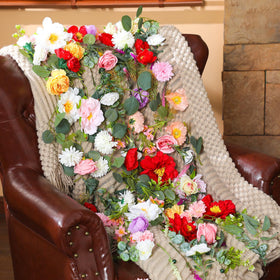 XunYee garland backdrop on a wedding arch for a romantic ceremony.