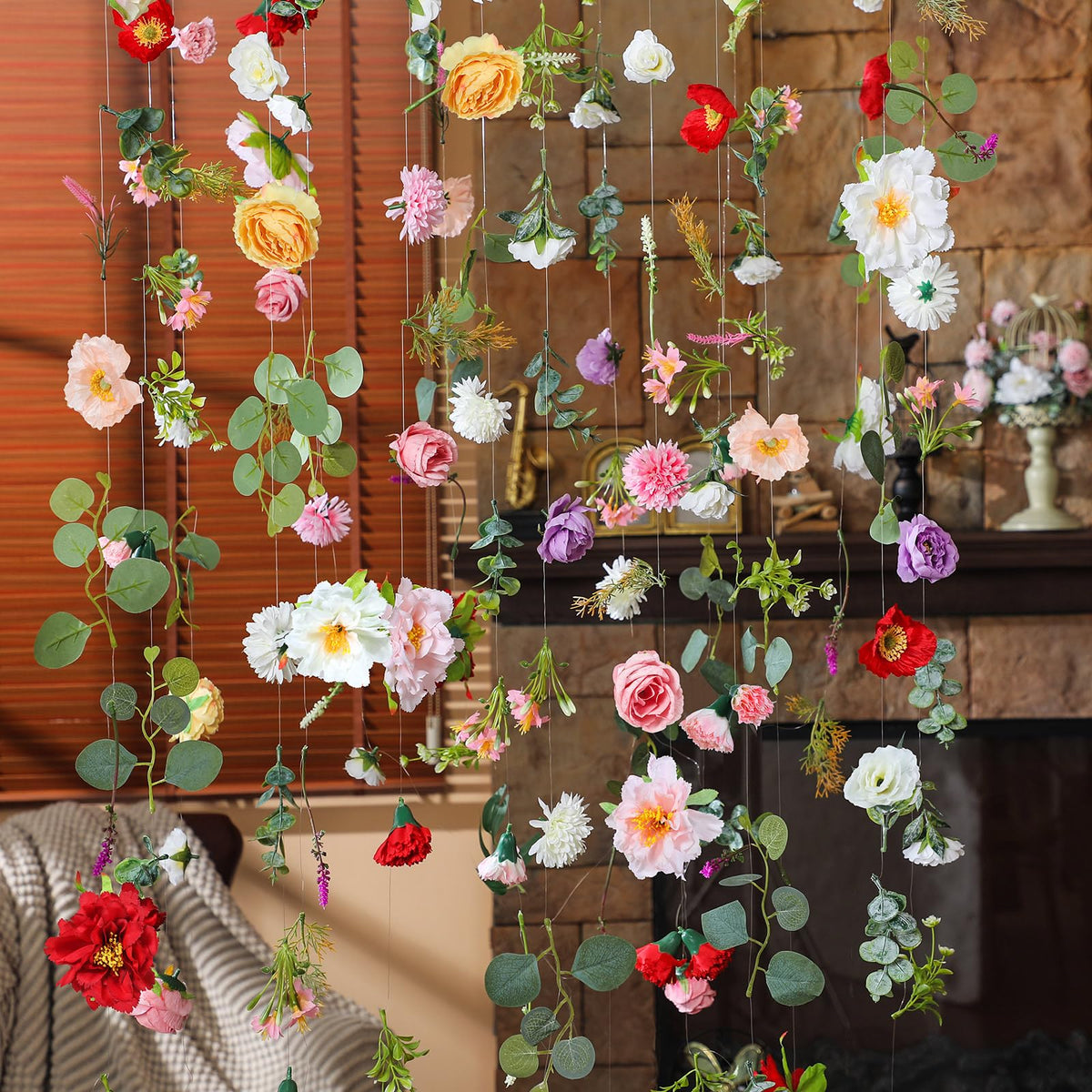 XunYee wildflower garland draped over mantel for cozy home decor.