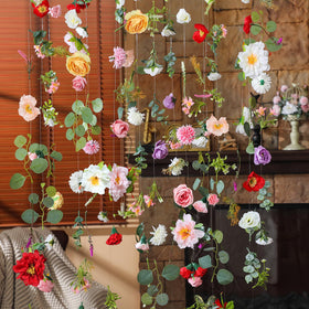 XunYee wildflower garland draped over mantel for cozy home decor.