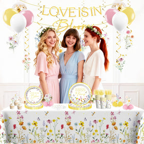 Xynic Love is in Bloom cake topper crowns the centerpiece beautifully.