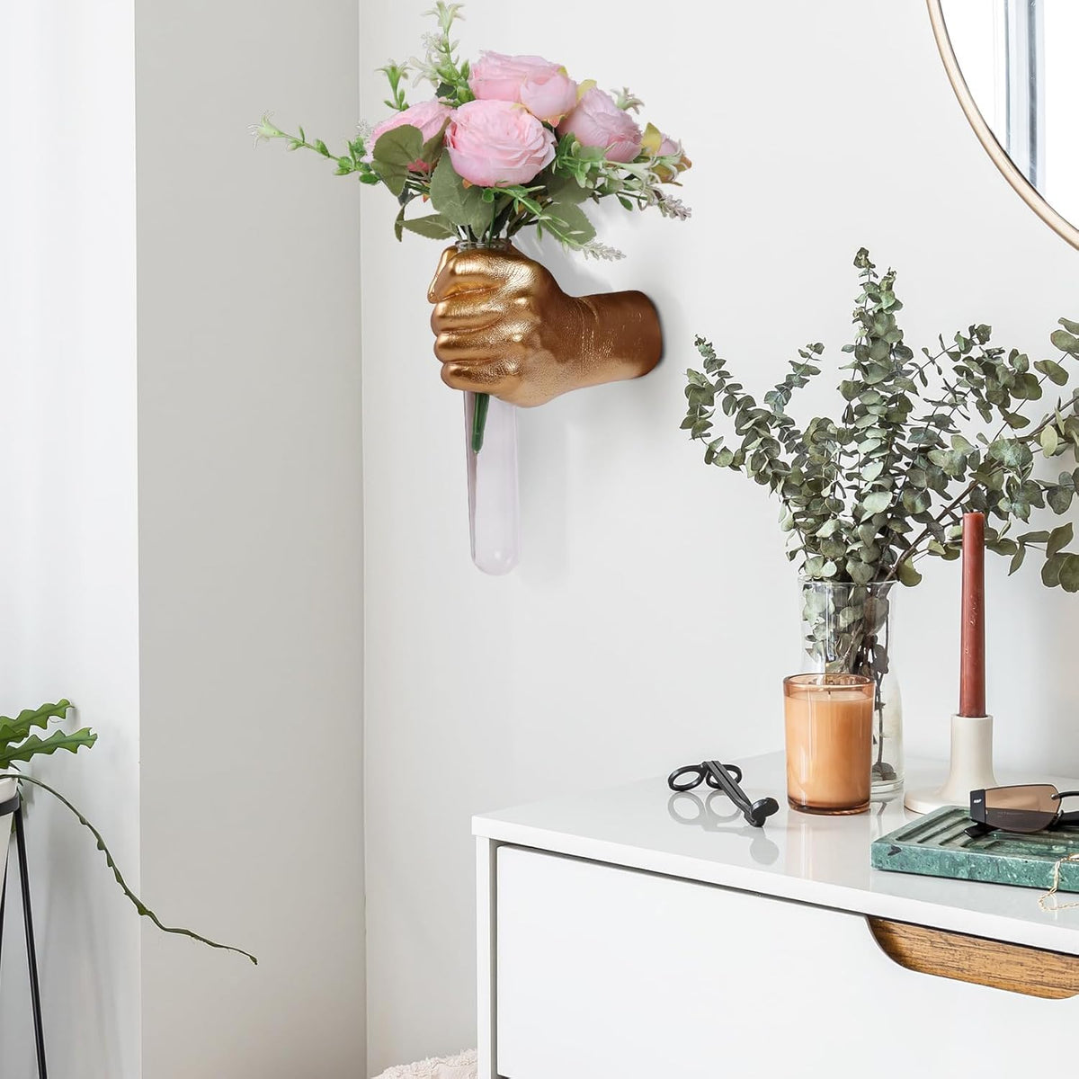 Stylish home accent for bedrooms, offices, or entryways with gold hand vase.