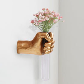 XYQXYQ gold wall sculpture with hand and glass test-tube vase for modern decor.