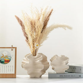 XYQXYQ Modern Art Ceramic Vase features durable ceramic construction and timeless design