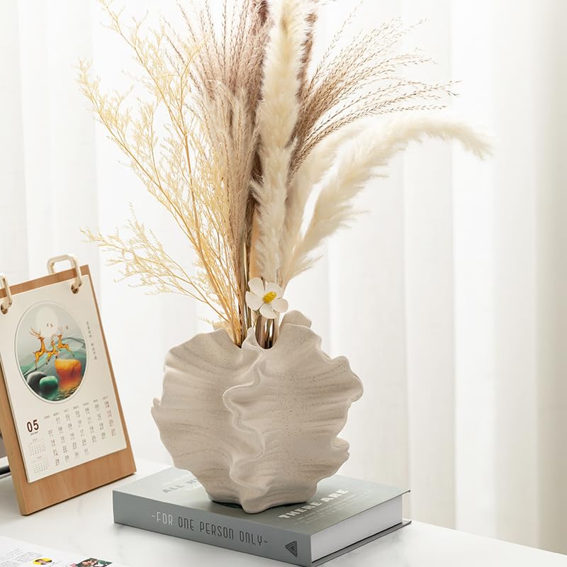 XYQXYQ Modern Art Ceramic Vase serves as a striking living room centerpiece