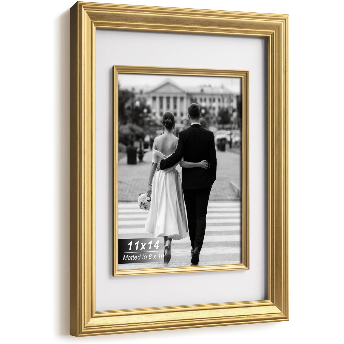 Yaetm gold frame with mat elevates 8x10 photos for wall display.