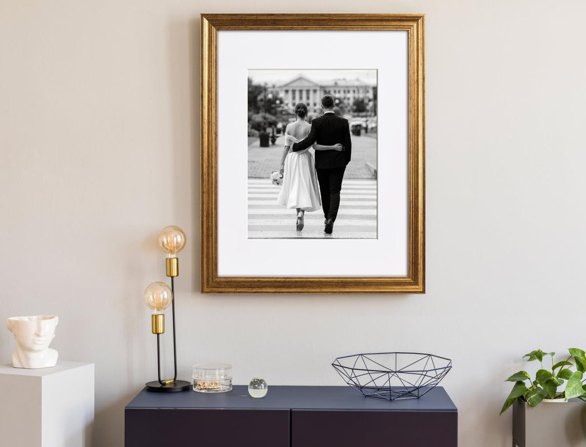 Yaetm living room setup featuring gold frame gallery wall