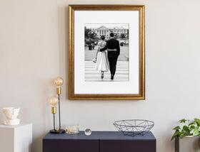Yaetm living room setup featuring gold frame gallery wall