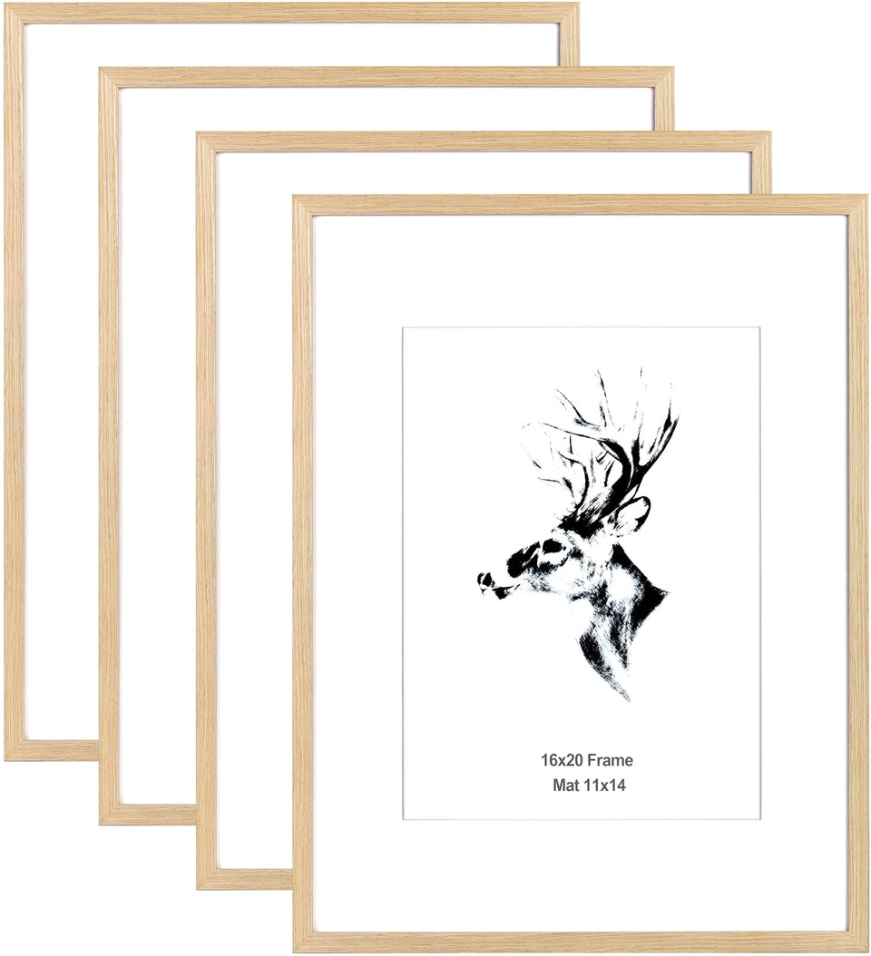Yaetm oak frame with mat showcasing 11x14 photos for a polished gallery wall.