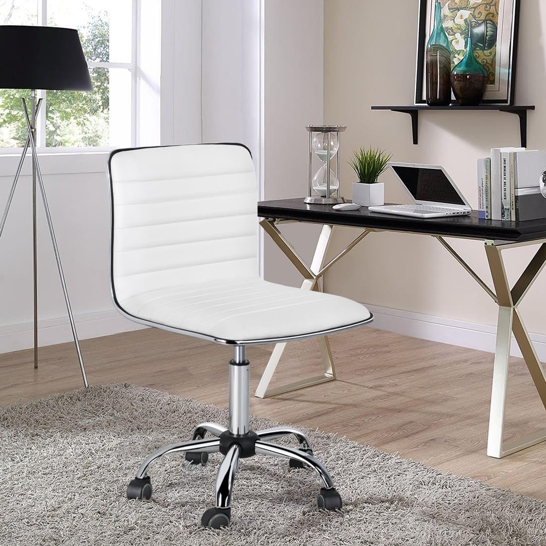 Yaheetech swivel chair wheels glide smoothly for quiet movement.