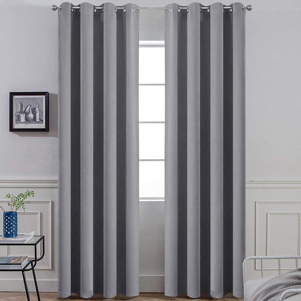 Yakamok gray blackout curtains, 84-inch pair block light for restful mornings.