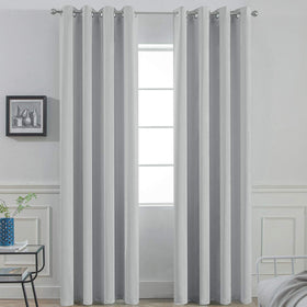 Yakamok soft blackout curtains in a bedroom with two panels blocking light for restful sleep