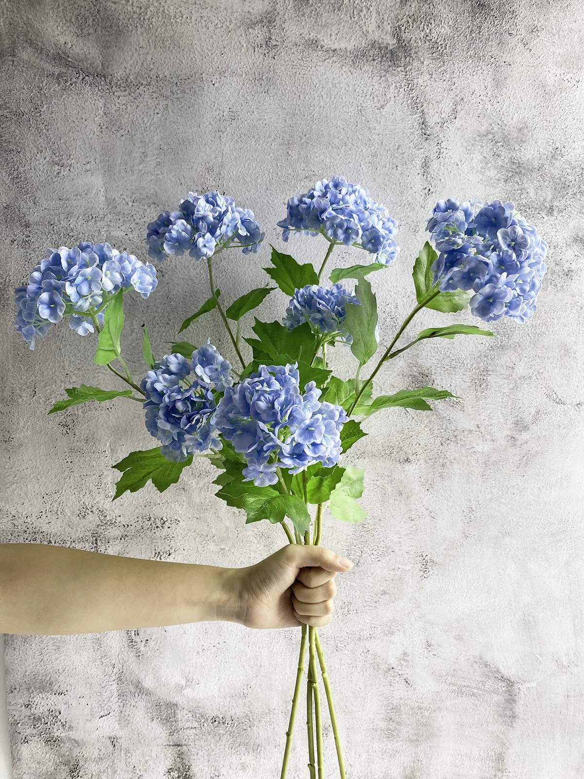 YalzoneMet wedding bouquet inspiration using lifelike hydrangea stems.
