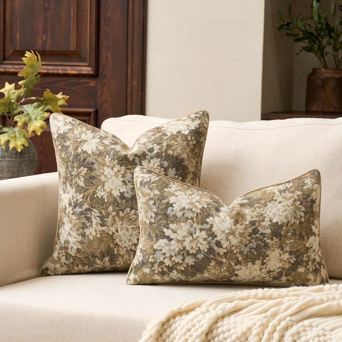 Yangest Neutral Floral Pillow Cover sofa display in versatile beige palette for coordinating decor.