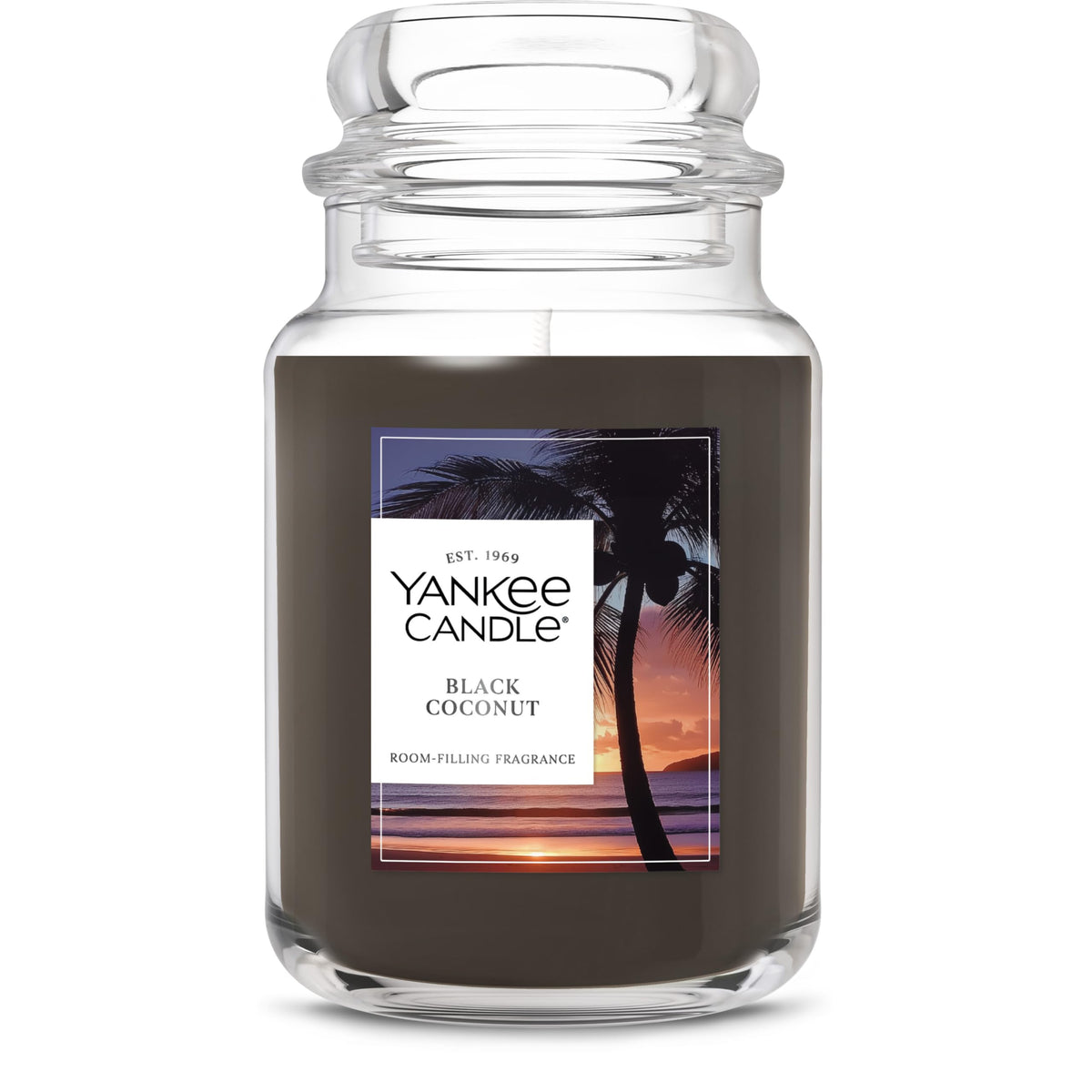 Yankee Candle Black Coconut jar closeup wick glowing for a cleaner burn and rich fragrance.