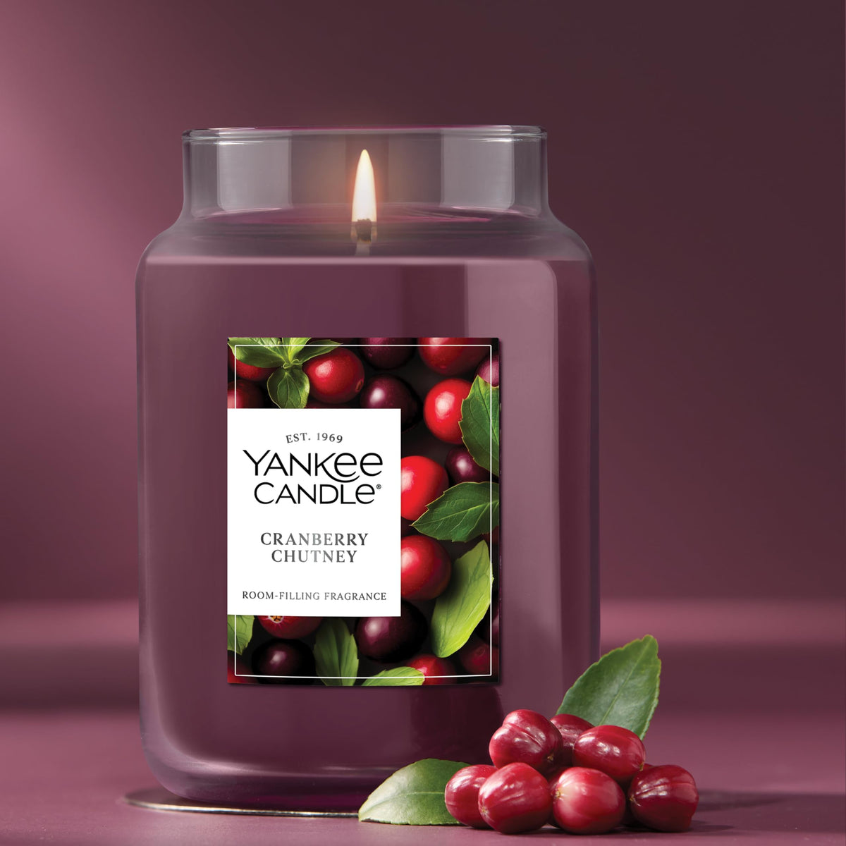 Yankee Candle Cranberry Chutney fragrance release visual with tart cranberry notes