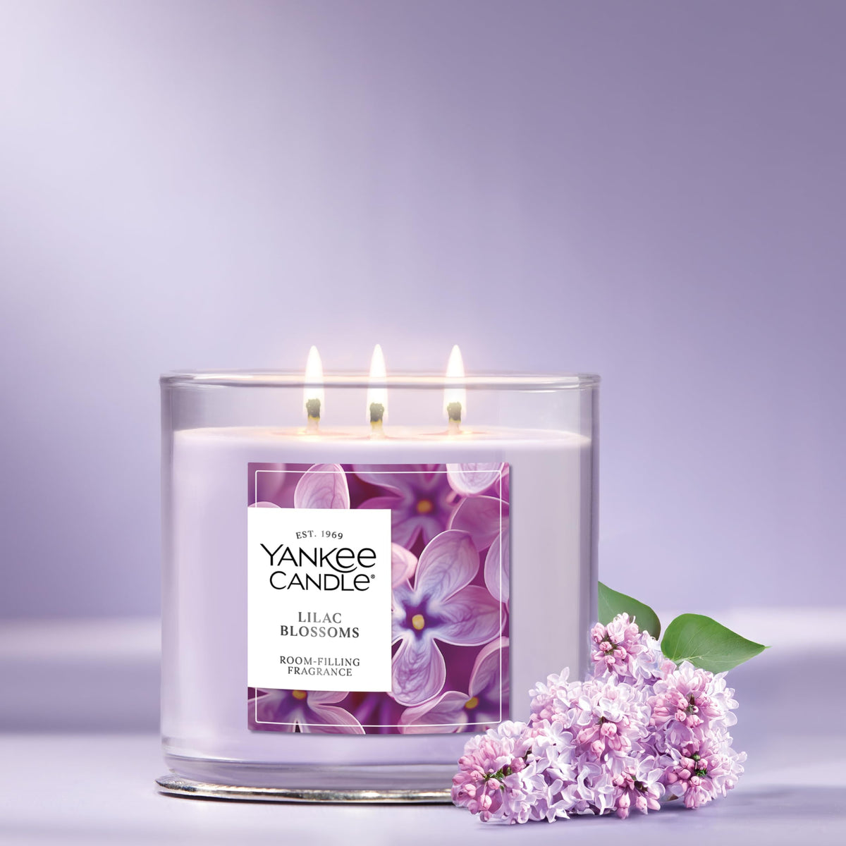 Yankee Candle Lilac Blossoms jar with decorative metal lid protecting wax