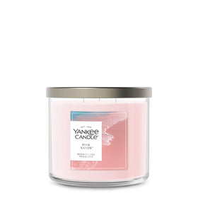 Yankee Candle Pink Sands 14.5oz jar brightens a living room with tropical fragrance.