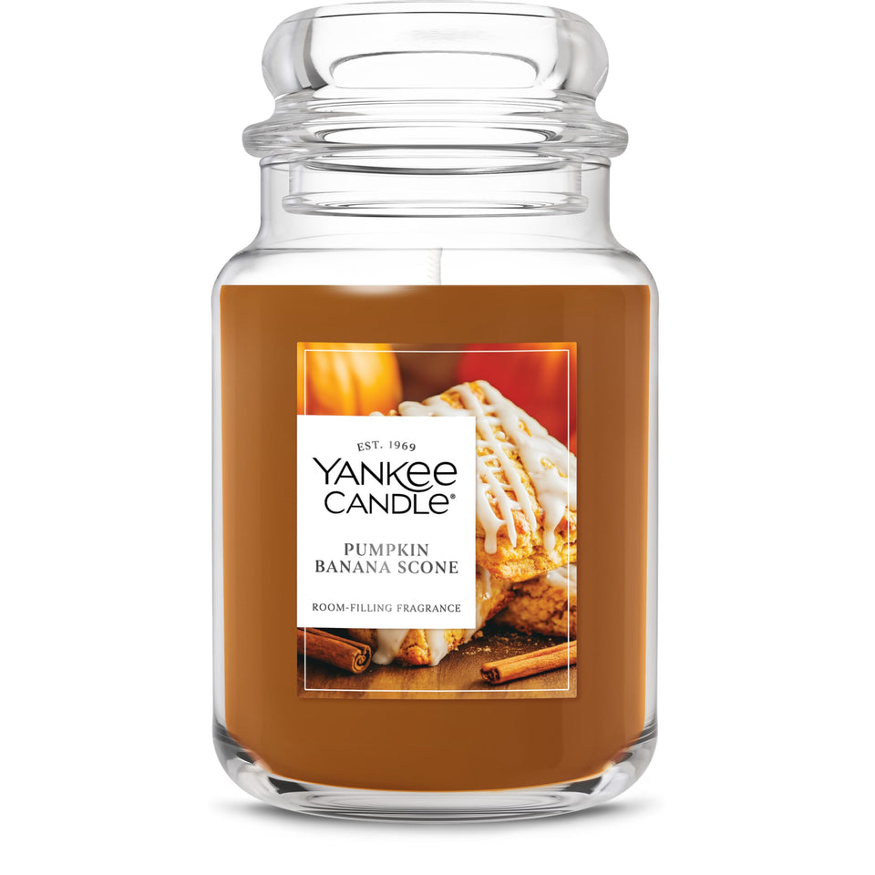 Yankee Candle Pumpkin Banana Scone jar releasing warm fall fragrance in a living room