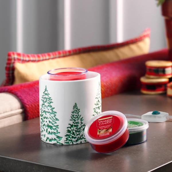 Yankee Candle Scenterpiece MeltCup easy-swap feature demonstrated with a cool-to-touch cup