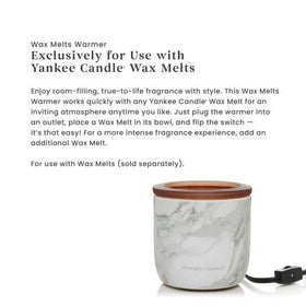 Wax warmer setup with Yankee Candle melts ready for use.