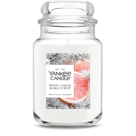 Yankee Candle White Spruce & Grapefruit 22oz jar top view with room-filling fragrance.
