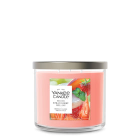 Yankee Candle White Strawberry Bellini candle jar emitting inviting fragrance