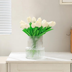 Dining table centerpiece using the YANWE1 ribbed vase with roses.