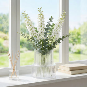 Office desk accented by the YANWE1 ribbed vase.