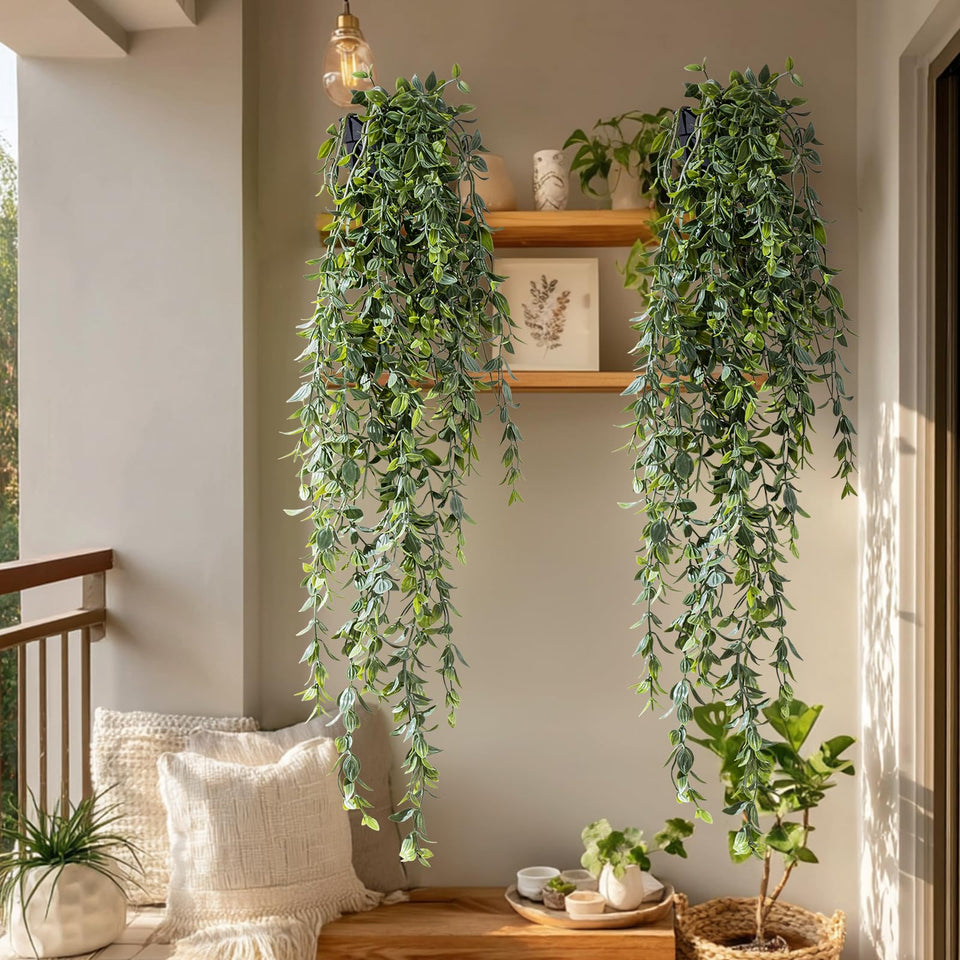 Yarmare 2-pack artificial hanging plant with black pots adds year-round greenery.