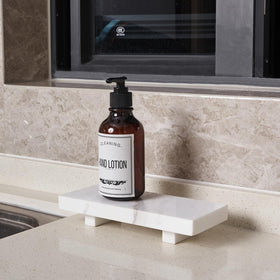 YCROJBK marble tray plant display provides a stable base for a small potted plant.