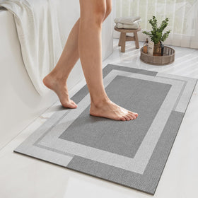 YDKGL non-slip bath mat with rubber backing in gray provides floor grip.