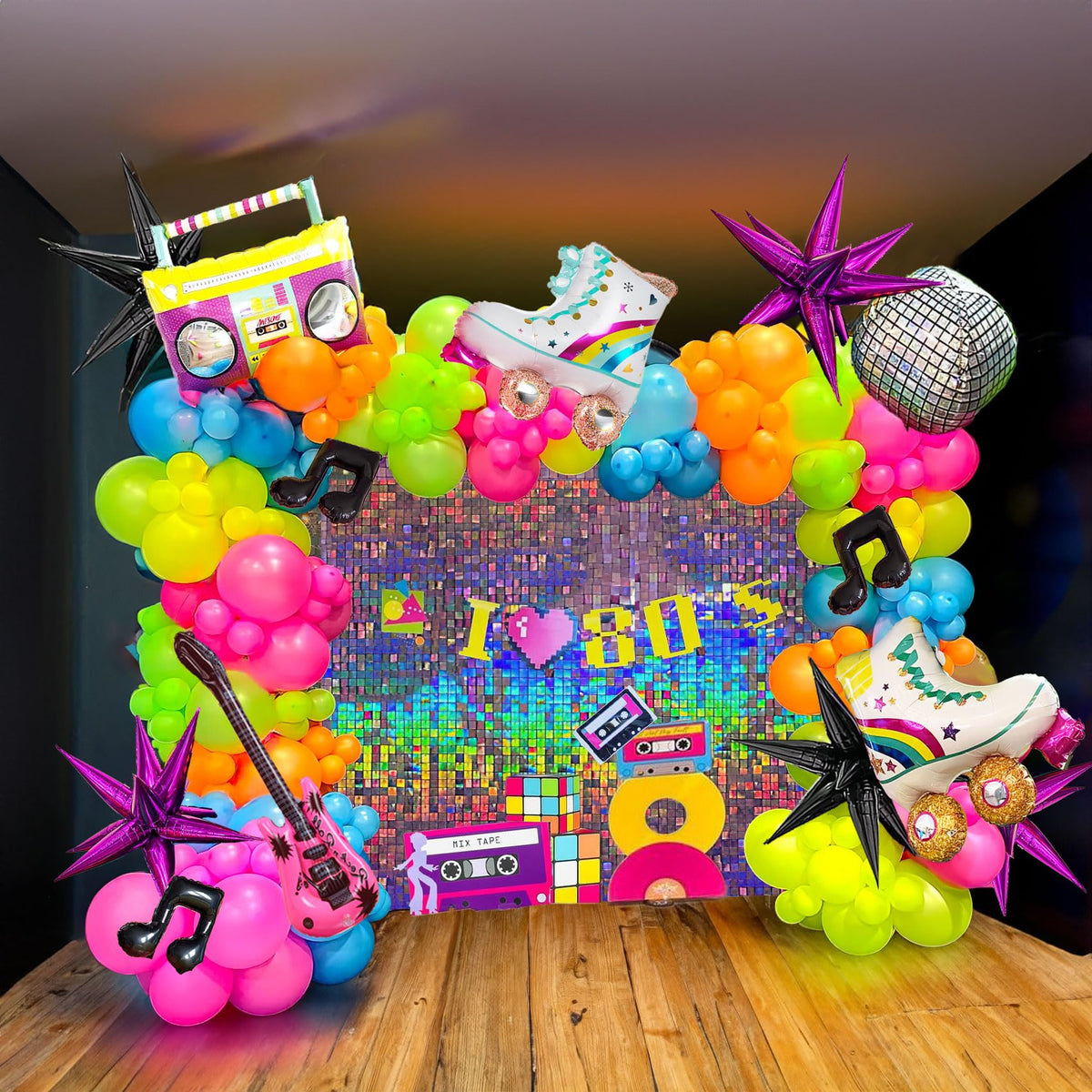 Yeewaka 80s balloon garland kit creates a vibrant party backdrop for photos