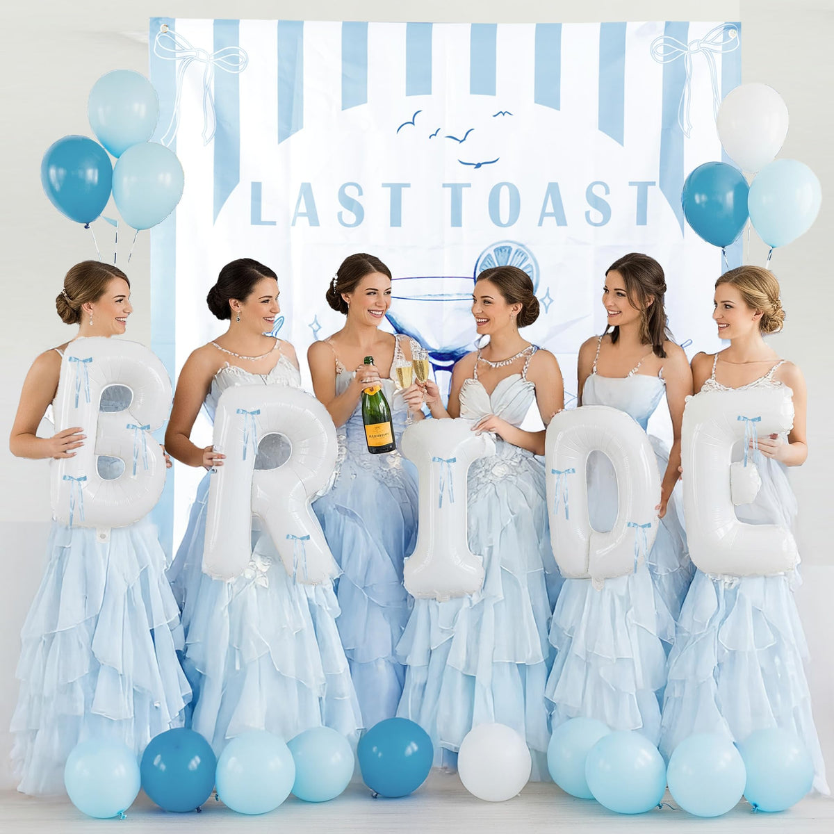 yeewaka Bride letter balloons provide a bold seaside centerpiece for photos