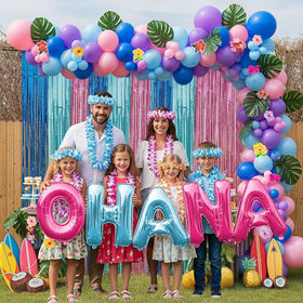Yeewaka fringe curtain tropical backdrop enhances festive atmosphere at summer celebrations.