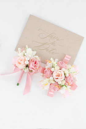 Yelinart boutonniere close-up with roses and orchids for men's formalwear
