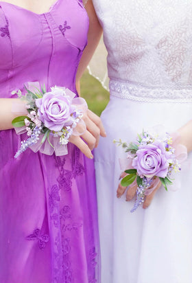 Yelinart hard-case packaging protects corsage and boutonniere during transport.