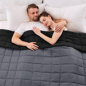 YesCool king-size weighted blanket on bed for shared sleep comfort.