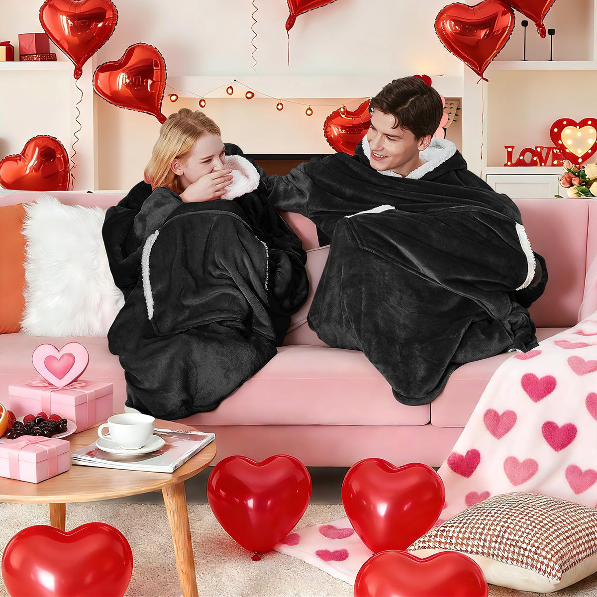 yescool wearable blanket hoodie black folded for compact storage and quick wearing.