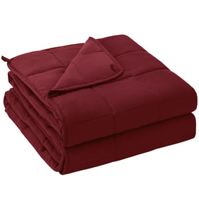 YesCool weighted blanket top-view on a bed creates a focused, personal sleep zone.