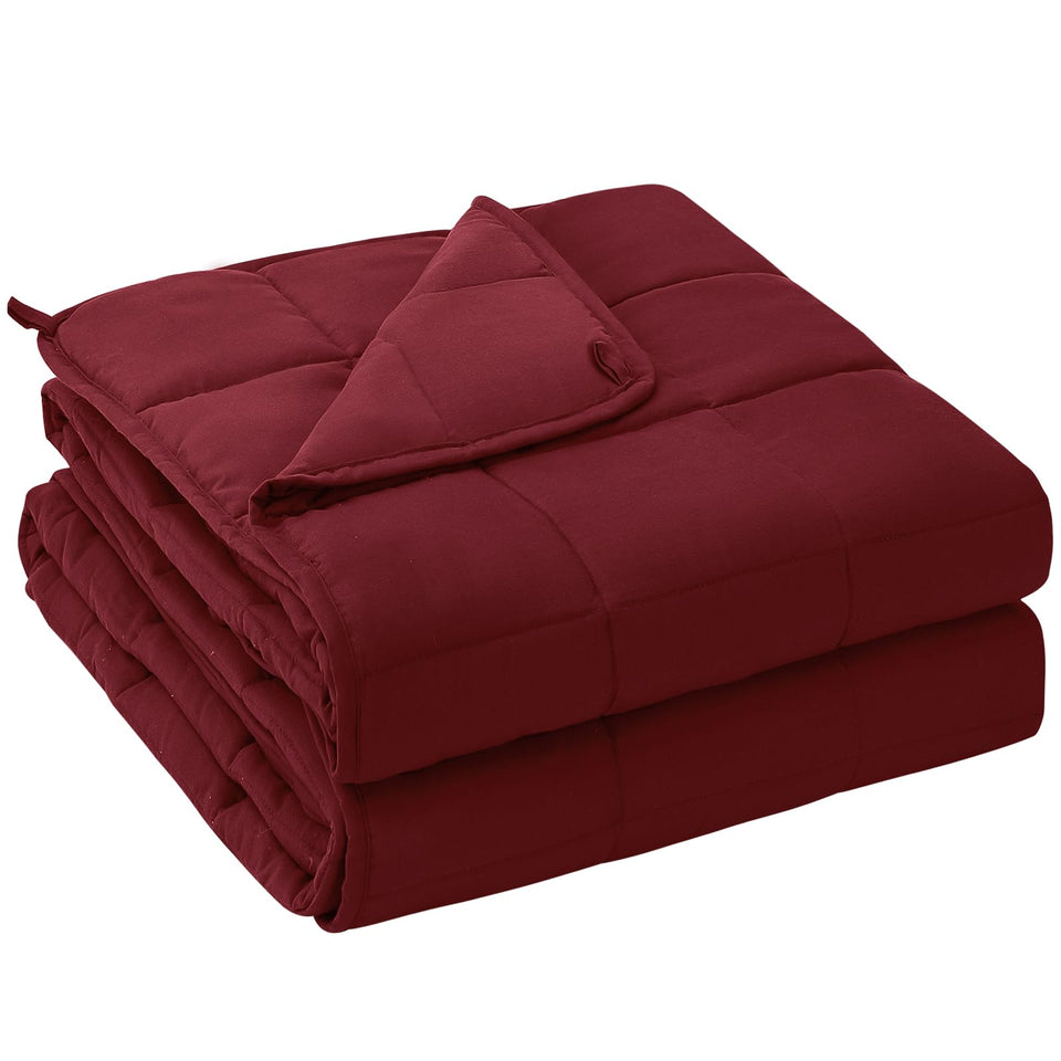 YesCool weighted blanket top-view on a bed creates a focused, personal sleep zone.