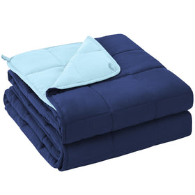 YesCool weighted blanket on bed with navy blue color, offering comfortable coverage
