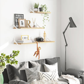 YGEOMER floating shelves in living room displaying plants, books, and decor