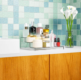 Yieach perfume organizer keeps bottles organized and easy to reach